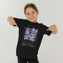 Load image into Gallery viewer, Girl wearing a black T shirt with Graffiti style stars in purple and white text saying Shine Bright beneath. Pink Runway design girls t shirt.