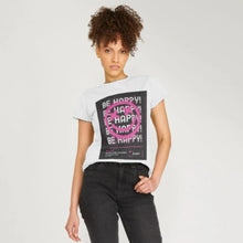 Load image into Gallery viewer, Young Woman wearing a white t shirt with Be Happy graphics on it and pink smiley face. From a collection by Pink Runway.

